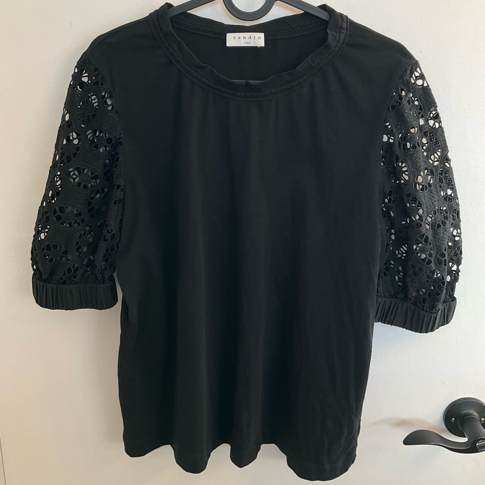 Sandro Paris black top with eyelet lace sleeves, size medium